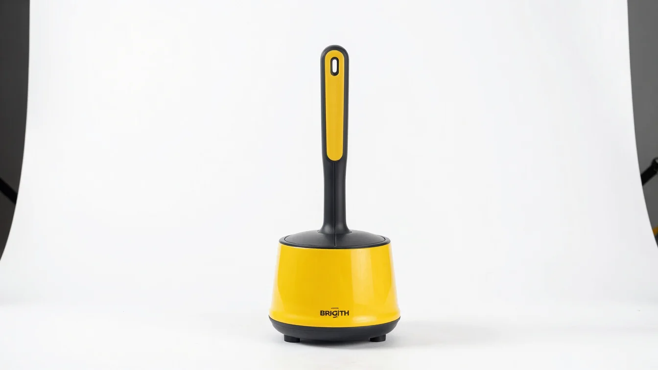 Bright studio product photography of a sleek kitchen gadget on a clean white backdrop, crisp studio light, vibrant comme